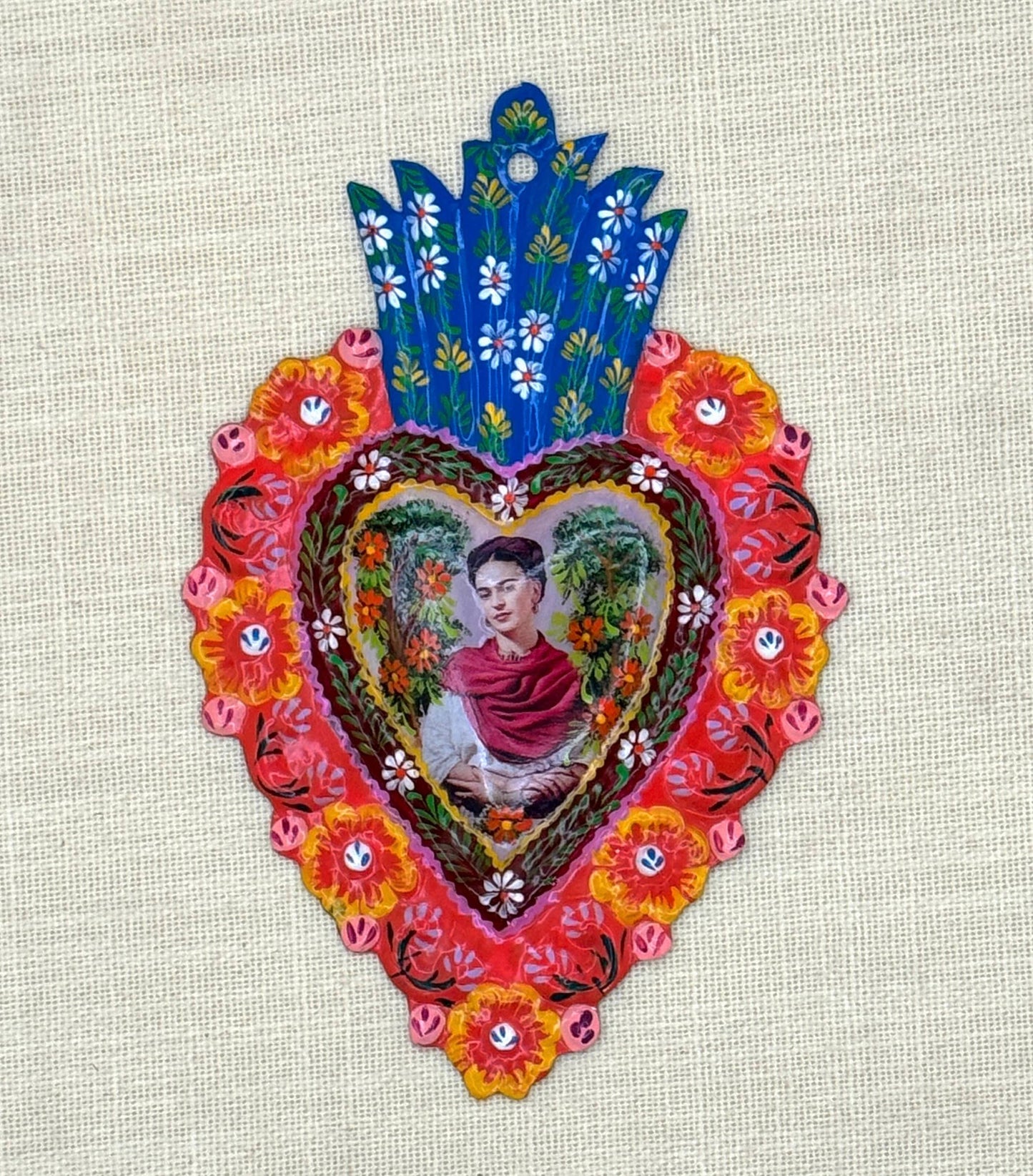 Small Frida Painted Milagro Heart – Handcrafted in Peru